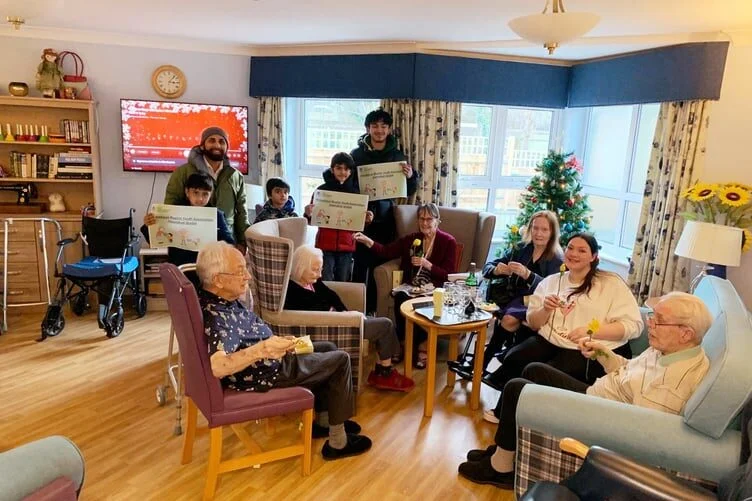 Community spirit as Ahmadiyya Muslim Youth Association visit care home on Christmas Eve