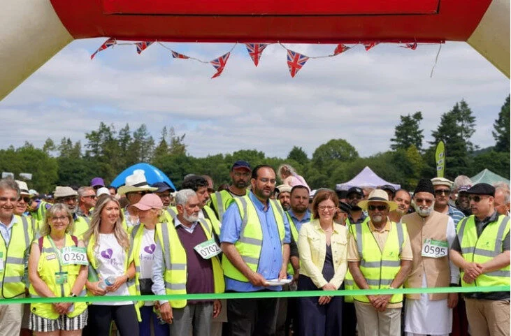 Hundreds take to the Surrey Hills for milestone Beacon of Peace walk
