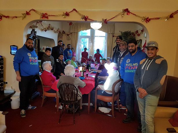 Young Muslim volunteers transport group of elderly people to Christmas lunch in ‘wonderful’ act of charity