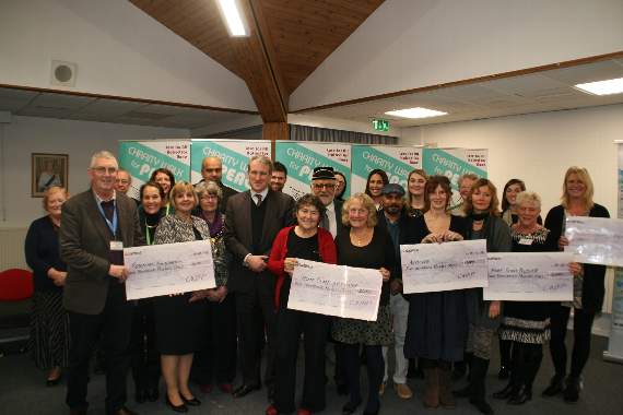 Walk shares £7,000 among charities
