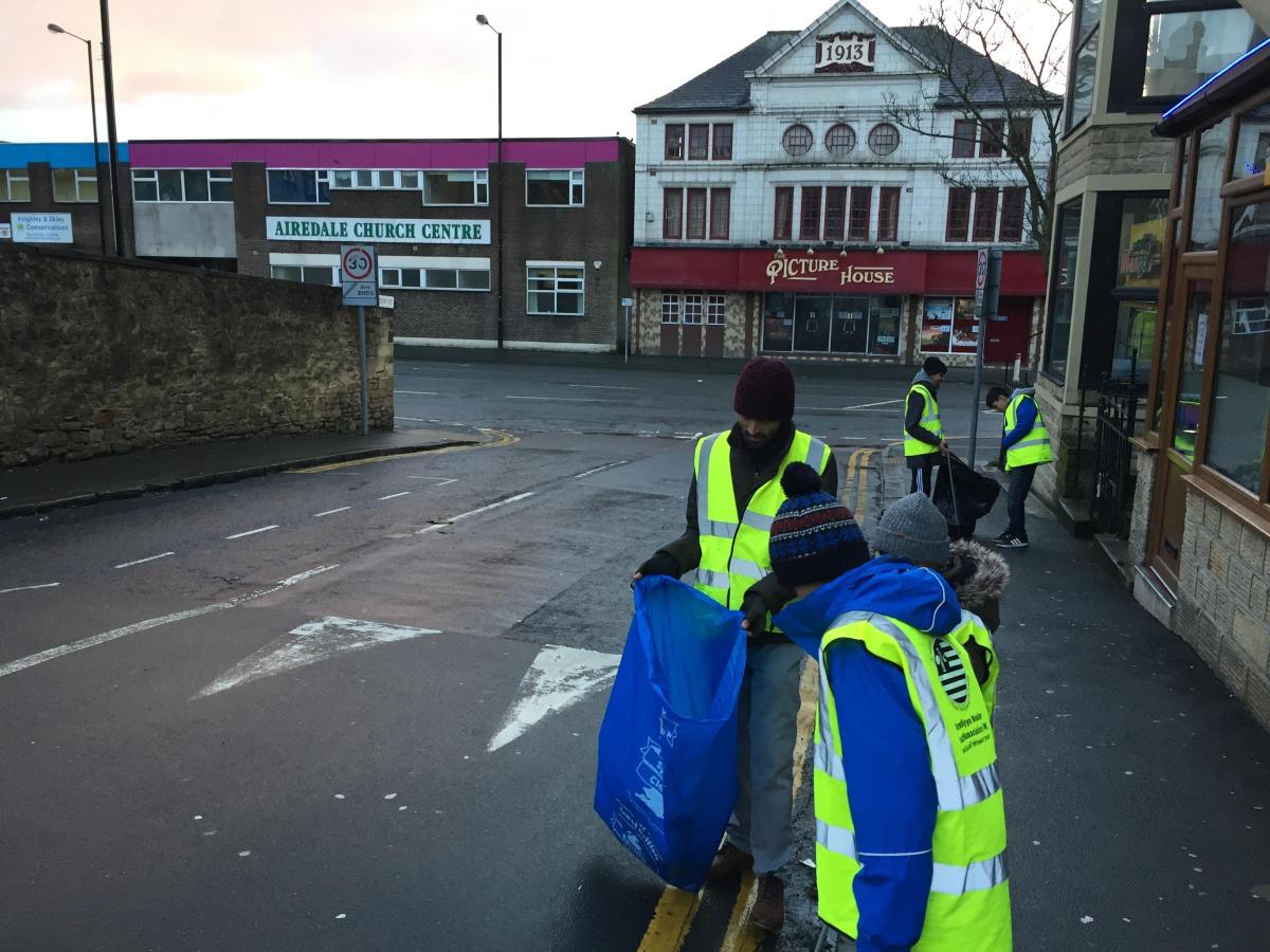 Early New Year clean up in central Keighley by volunteers from Ahmadiyya Muslim group