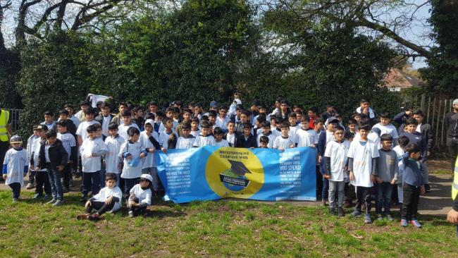 Young Muslims from the Ahmadiyya Muslim children’s association walk for charity to help schools in Africa