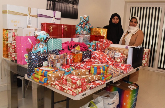 Ahmadiyya Muslim Women’s Association donate more than 100 Christmas presents to women and children living in refugee centre