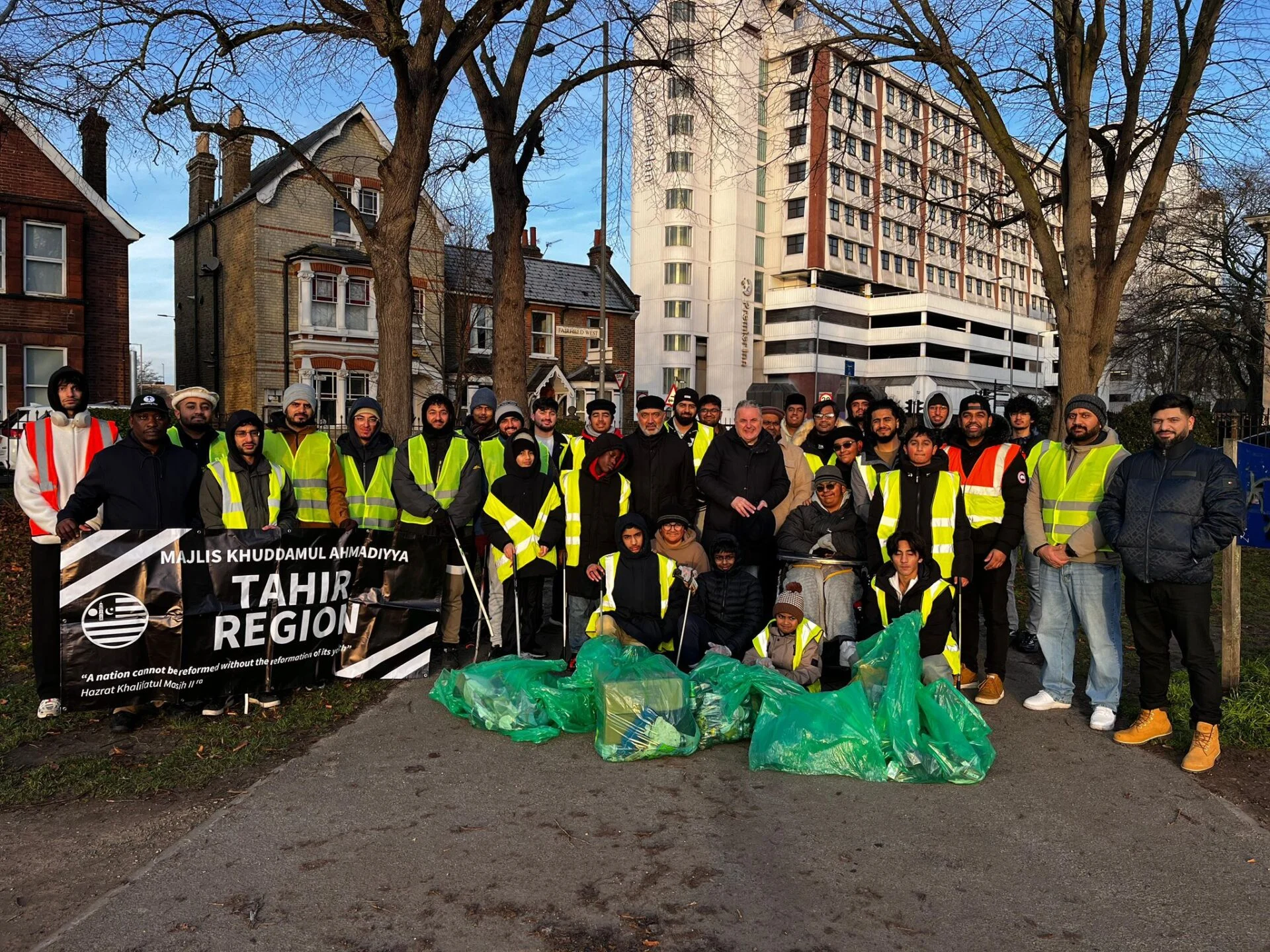 Kingston mayor, Cllr Noel Hajdimicheal joined Ahmadiyya Muslim youths cleaning up the city centre on New years day